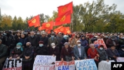 Supporters of former Kyrgyzstan President Almazbek Atambayev attend a rally in Bishkek, Kyrgyzstan, on Oct. 9, 2020.