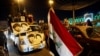 Iraqi supporters of Muqtada al-Sadr's movement celebrate after Iraq's Supreme Court ratified the results of parliamentary election, in Najaf, Iraq, Dec. 27, 2021.