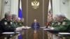 Russian President Vladimir Putin, center, chairs a meeting on the defense industry at the Bocharov Ruchei state residence in Sochi, Russia, Nov. 10, 2015. 