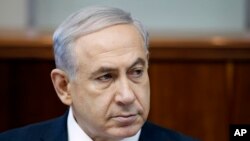 Perdana Menteri Israel Benjamin Netanyahu menghadiri rapat kabinet mingguan di Yerusalem, Minggu, 22 Juni 2014.