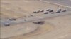 Sejumlah kendaraan pihak berwenang berada di lokasi tabrakan pesawat di Bandara Regional Marana, Arizona, pada 19 Februari 2025. (Foto: KNXV via AP)