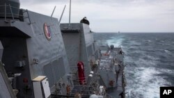 The guided-missile destroyer USS Ralph Johnson conducts routine operations in the Taiwan Strait on Sept. 9, 2023 (U.S. Navy via AP). U.S. officials said on Oct. 5, 2023, that China may not have the appetite for an attempted blockade of Taiwan. 