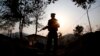 A Kachin Independence army rebel stands at frontline outpost facing no man's land in Lawa Yang, outside of Laiza, the armed group's headquarters in northern Kachin state, Myanmar, March 20, 2018. The war between Myanmar’s government forces and the Kachins is one of the longest-running wars on Earth, and it has intensified dramatically in recent months, with at least 10,000 people been displaced since January alone, according to the United Nations.