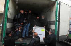 Gaza receives its first COVID-19 vaccine shipment, Feb. 17, 2021.