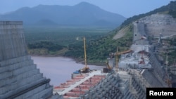FILE - Ethiopia's Grand Renaissance Dam is seen as it undergoes construction work on the river Nile in Guba Woreda, Benishangul Gumuz Region, Ethiopia, Sept. 26, 2019. 