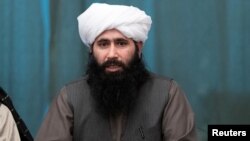 Mohammad Naeem, spokesman for the Taliban's political office, speaks during a joint news conference in Moscow, Russia, March 19, 2021. (Alexander Zemlianichenko/Pool via Reuters)