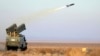 In this photo provided Jan. 12, 2025, by the Iranian Army, a missile is launched during a drill in Iran.