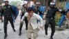 Vendor Killed as Protesters Clash With Police