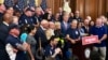 Aktivis dan selebritas Jon Stewart, berbicara atas nama para korban serangan teror 9/11 dan kerabat mereka, dalam konferensi pers di Capitol, Washington, 12 Juli 2019. 