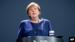 Kanselir Jerman Angela Merkel di Berlin, Jerman, 9 November 2020. (Michael Kappeler/DPA via AP, Pool)
