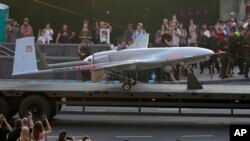 FILE - A Turkish-made Bayraktar TB2 drone is seen during a rehearsal of a military parade dedicated to Independence Day in Kyiv, Ukraine, Aug. 20, 2021.