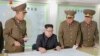 朝鲜官媒视频截图显示金正恩在平壤听取军队汇报。