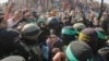 Hamas frees eight more hostages under Gaza ceasefire