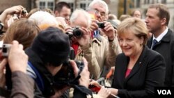 Kanselir Jerman Angela Merkel saat tiba di acara perayaan 20 tahun reunifikasi Jerman di Bremen, Jerman bagian utara, awal bulan ini.