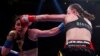 Ilustrasi. Laga tinju perempuan antara Katie Taylor v Delfine Persoon. (Foto: via Reuters/Andrew Couldridge)