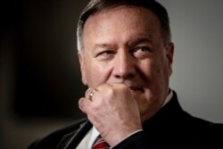 US Secretary of State Mike Pompeo looks on during a press conference in Eigtved's Warehouse, in Copenhagen Wednesday July 22, 2020.