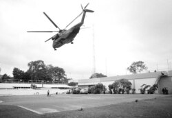 FILE - This photo shows some of the last-minute evacuation of authorized personnel and civilians from Saigon, Vietnam, April 29, 1975.