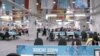 Media Workroom inside of the Olympic Press Center, Olympic Village, Sochi, Russia, Feb. 16, 2014. (Parke Brewer/VOA)