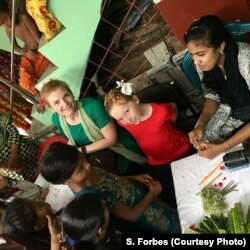 Sasha Forbes and her 9-year-old daughter Maya visit a new village being served by the Girls Education Program in Khulna, Bangladesh, April 2018.