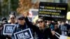 FILE - Supporters hold a rally in solidarity with Hong Kong protesters, in Vancouver, British Columbia, Sept. 29, 2019. 