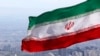 FILE - Bendera nasional Iran berkibar di Teheran, Iran, 31 Maret 2020. (AP/Vahid Salemi, File)