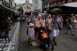 Foreign tourists visit Buyukada, the largest of the Princes' Islands in the Sea of Marmara, off Istanbul, Turkey, July 14, 2021.