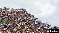 Rohingya refugees gather to mark the second anniversary of the exodus at the Kutupalong camp in Cox’s Bazar, Bangladesh, August 25, 2019.