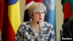 Perdana Menteri Inggris Theresa May berbicara dalam sebuah pertemuan di sela-sela Sidang Umum PBB ke-72 di Markas Besar U.N. di New York, 19 September 2017.