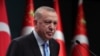 Presiden Turki Recep Tayyip Erdogan memberikan keterangan kepada wartawan setelah pertemuan Kabinet, di Ankara, Turki, Senin, 11 Januari 2021. 