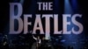 FILE - Paul McCartney and Ringo Starr perform during the taping of "The Night That Changed America: A GRAMMY Salute To The Beatles" in Los Angeles on Jan. 27, 2014. The Beatles are releasing their final single, "Now and Then," in November 2023.