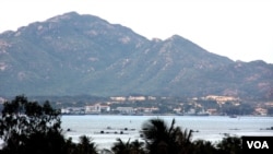 FILE - Vietnam Navy ships barely visible inside Cam Ranh Bay (D. Schearf/VOA)