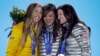 Women's snowboard halfpipe medalists, from left, Torah Bright of Australia, silver, Kaitlyn Farrington of the United States, gold, and Kelly Clark of the United States, bronze, pose with their medals at the 2014 Winter Olympics in Sochi, Feb. 13, 2014. 