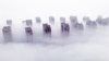 Residential buildings are shrouded in fog in Lianyungang, in eastern China's Jiangsu province, on March 12, 2025. 