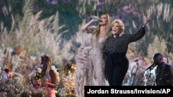 Jennifer Lopez performs with her mother, Guadalupe Rodríguez, at ‘Vax Live: The Concert to Reunite the World on May 2, 2021, at SoFi Stadium in Inglewood, Calif. 