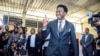 FILE - Independent candidate Venancio Mondlane holds up his finger after casting his vote in general elections in Maputo, Mozambique, Oct. 9, 2024.