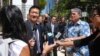 Hawaii Attorney General Douglas Chin speaks outside Federal Court house in Honolulu, March 29, 2017. Chin, the son of Chinese immigrants, argues that the Trump White House's travel ban, even its revised version, is discriminatory.