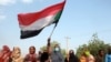 Para warga Sudan menggelar protes terhadap kudeta yang dilakukan pihak militer terhadap pemerintahan transisi yang berkuasa, di Distrik al-Shajara, sebelah selatan ibu kota Sudan, Khartoum, pada 25 Oktober 2021. (Foto: AFP)