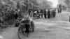 Cambodians pulled carts of their belongings back to their home villages after the fall of the Democratic Kampuchea regime, in January 1979. (Courtesy of Documentation Center of Cambodia Archives)