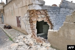A picture taken on January 26, 2018, shows a damaged house in the Syrian town of Rajo in the Afrin District, Jan. 26, 2018.