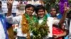 ကိုအောင်မင်းနိုင် (ဘယ်)၊ ကိုရန်နိုင်ထွန်း (ညာ)။