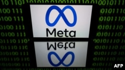 FILE - This picture taken on Jan. 12, 2023, in Toulouse, France, shows a tablet displaying the logo of the company Meta. The company is reportedly planning to offer European users subscription-based versions of Instagram and Facebook.