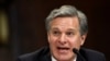 រូបឯកសារ៖ នាយក FBI លោក Christopher Wray ធ្វើការផ្តល់សក្ខីកម្មនៅវិមាន Capitol Hill ក្នុងរដ្ឋធានីវ៉ាស៊ីនតោន កាលពីថ្ងៃទី២៣ ខែកក្កដា ឆ្នាំ២០១៩។ 