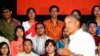 Participants listen as U.S. President Barack Obama holds a town hall-style meeting with a group of Young Southeast Asian Leaders Initiative (YSEALI) attendees, alongside his participation in the ASEAN Summit, at Souphanouvong University in Luang Prabang, 