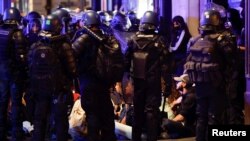 Fourth night of riots after teenager shot dead by police in Paris suburb
