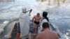 Orthodox Epiphany Tradition Marked by Conflict Near Ukraine Front Lines 