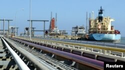 FILE - An oil tanker is seen at Jose refinery cargo terminal in Venezuela in this undated file photo. 