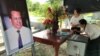 A woman paid her respect to slain political analyst Kem Ley on the third anniversary of his death at his home in Leay Bor commune in Takeo province's Tram Kam district, Cambodia, July 7, 2019. (Hul Reaksmey/VOA Khmer) 