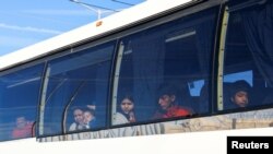 Migrants, mostly Venezuelans, are transported aboard a bus from Mexico's National Institute of Migration (INM) after being expelled from the United States through the Jeronimo-Santa Teresa border crossing in Ciudad Juarez, Mexico, Jan. 24, 2025. 