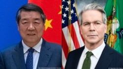中国国务院副总理何立峰(左)、美国财政部长贝森特