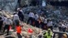Spasioci u potraži za preživelima u Surfsajdu na Floridi (Foto: Reuters/Florida Task Force 3)
